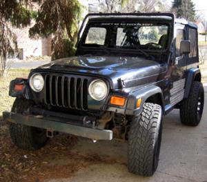 97 Jeep Wrangler - black, reli